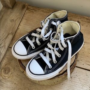 Black and white high top converse